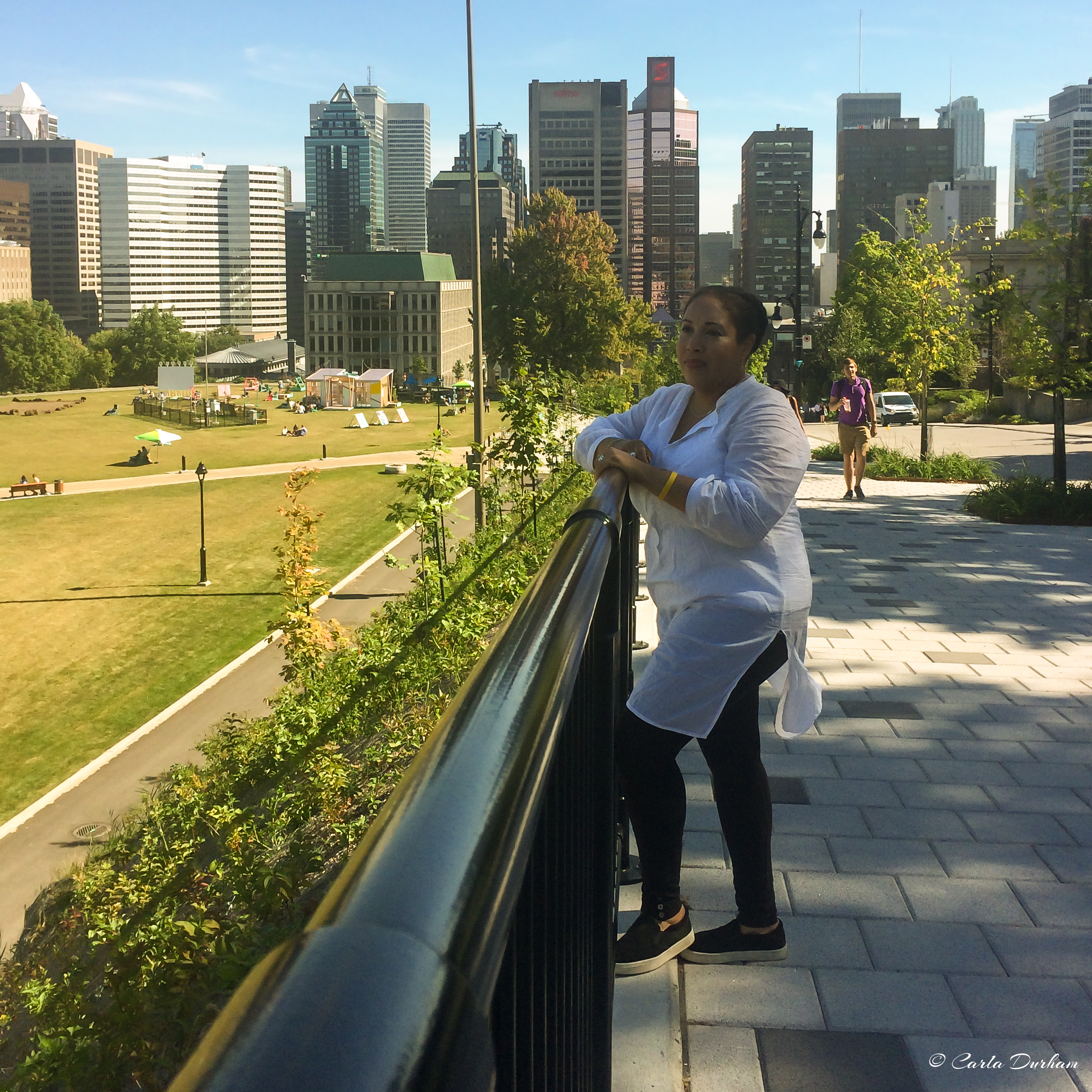Carla Durham in Montreal, Canada with the skyline in the background